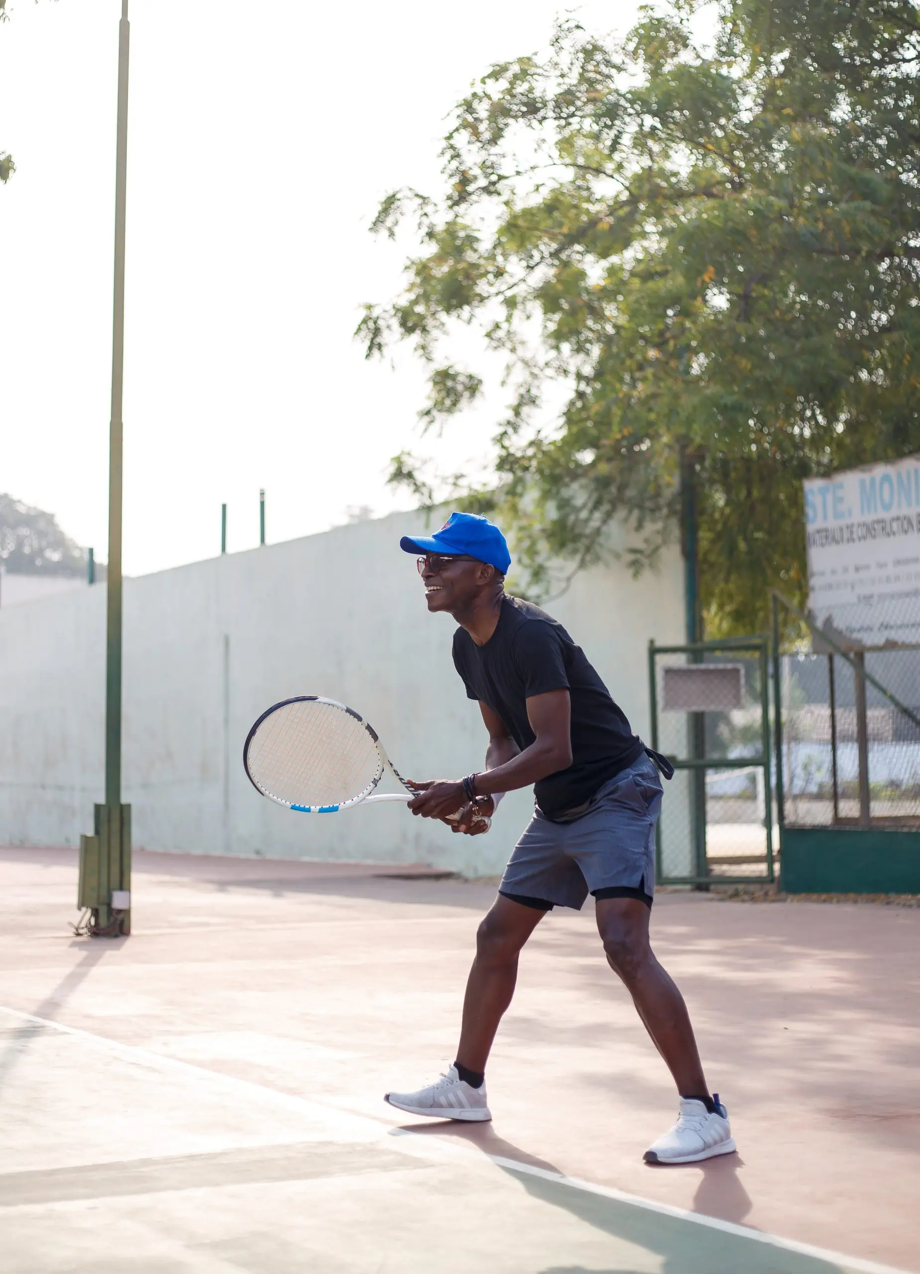 Richard Meseko playing tennis.