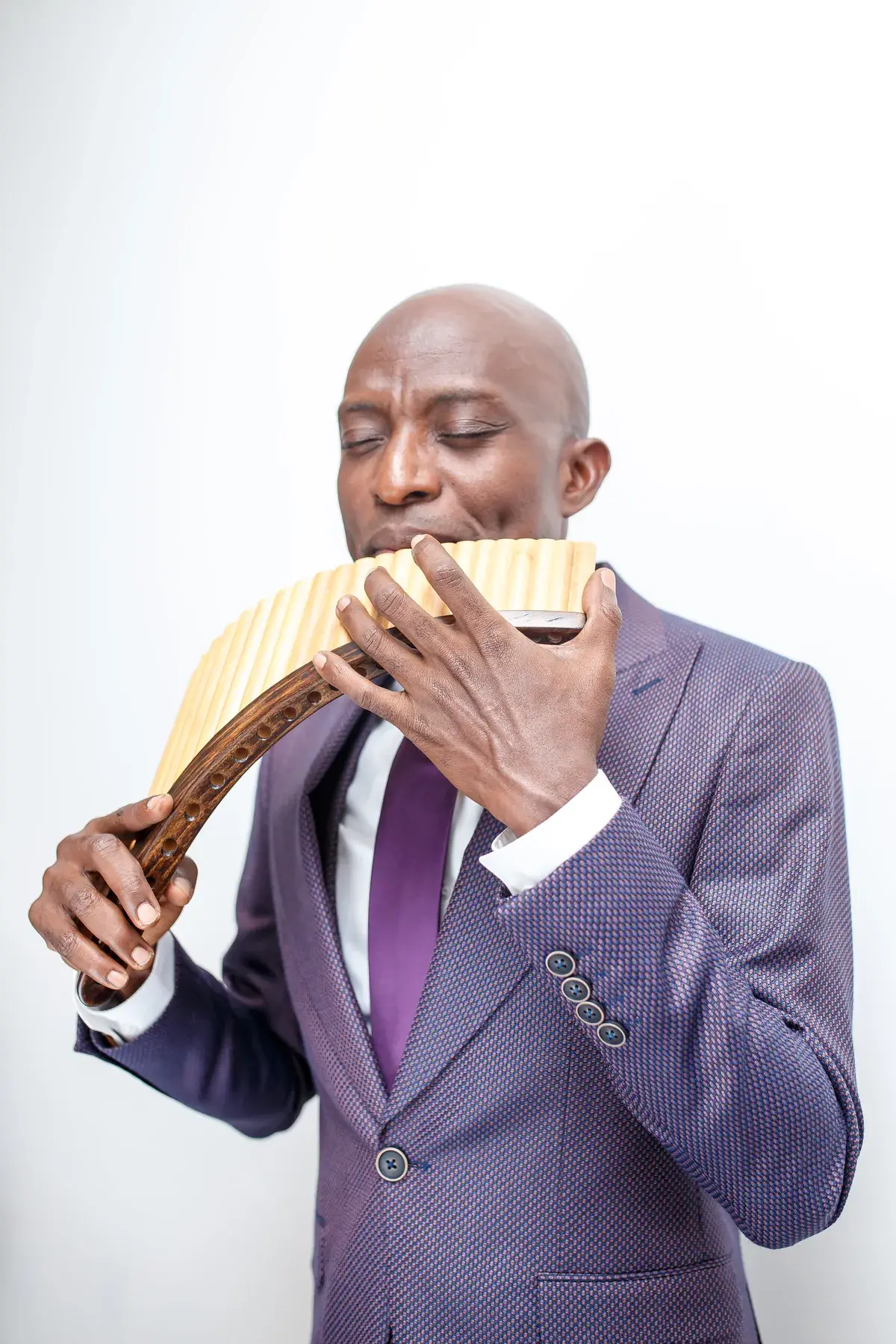 Richard Meseko playing the pan flute.